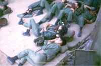 #K16 Some good guys outside the hanger at Vinh Long. Old military adage "why should a soldier stand when he can sit, why should he sit when he can lay down, why lay down when you can sleep?" Enough said - after all, we trained 'em! 